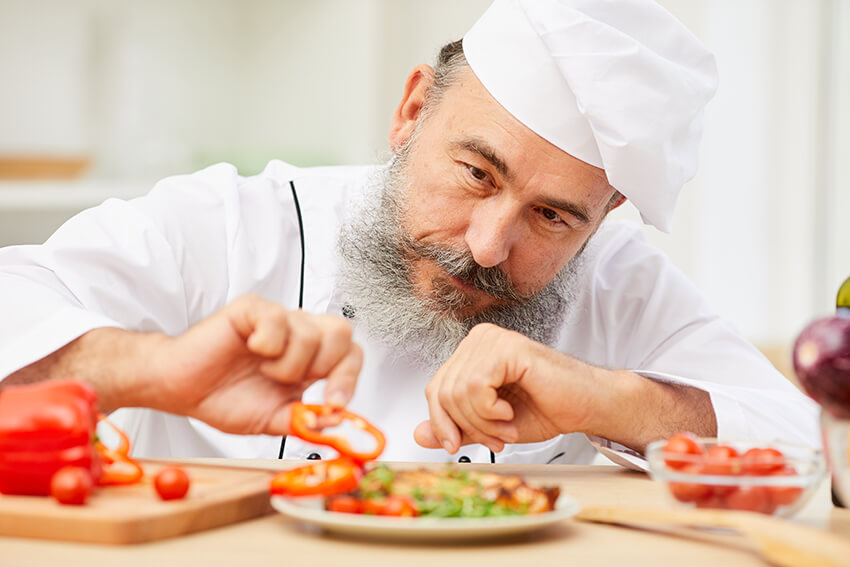 chef-plating-dish-in-restaurant-2021-09-24-04-04-22-utc.jpg